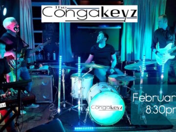 Slide with The Congakeyz 4 band members on stage under blue lighting with text promoting their 15 February gig at the Club.