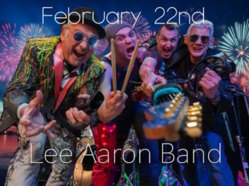 The 4 Lee Aaron Band members in fun pose for photo against a fireworks backdrop promoting their 22nd February gig at the Club.